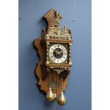 Dutch style wall hanging clock, with Atlas figure and burnished metal mounts,