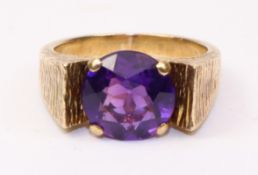 Gold ring set with amethyst coloured stone tested to 9ct approx 8gm gross Condition