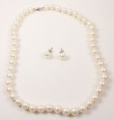Freshwater pearl necklace and matching pair ear-rings stamped 925 Condition Report