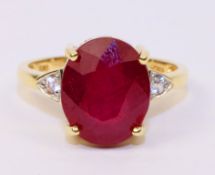 Hallmarked 9ct gold ruby ring with diamond shoulders Condition Report <a