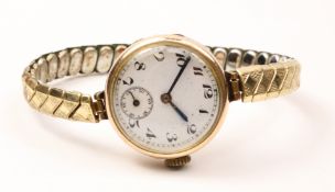 Early 20th century hallmarked 9ct gold wristwatch on Monvil rolled gold expanding bracelet