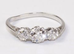 Mid 20th century three stone diamond ring tested to platinum, centre stone approx 0.