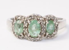Emerald and diamond cluster ring stamped 925 Condition Report <a href='//www.