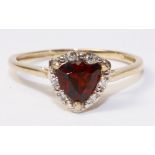 Heart shaped garnet and diamond cluster ring hallmarked 9ct Condition Report <a