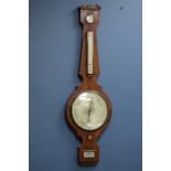 Regency figured mahogany four dial mercury column barometer, engraved silvered dial signed 'A.