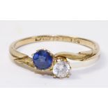 Diamond and sapphire cross-over ring hallmarked 18ct Condition Report <a
