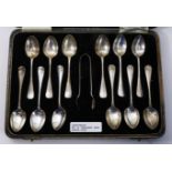 Set of twelve hallmarked silver teaspoons and sugar nips,