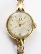 Ladies Omega Swiss hallmarked 18ct gold watch on hallmarked 9ct gold bracelet 17.