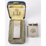 Two vintage Dunhill lighters nos 390107 and RE24163 Condition Report <a