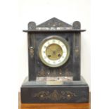 Late 19th century black slate mantel clock, engraved decoration,