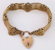 Six bar gold gate bracelet stamped 9ct approx 28.
