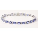 18ct white gold bracelet set with oval sapphires and diamonds stamped 750 Condition