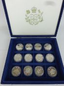 Twelve Westminster Elizabeth II Silver Jubilee silver & enamel proof crowns, boxed,