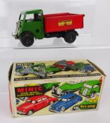 Triang Minic S. B. Tipper, green cab, red tipper with black hubs, with key, boxed.