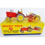 Dinky Toys die-cast model 310 Farm Tractor & Hay Rake red body with yellow hubs, brown driver,