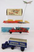 Wells Brimtoy Mechanical 6 Wheel Covered Lorry 9/520 Lyons Tea, with opening rear door, boxed,