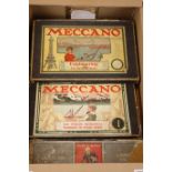 Collection of early Meccano in black bordered boxes including 1, 1A, 2, , Accessory outfits 0A, 1A,