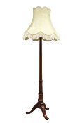 20th century carved mahogany Hepplewhite style standard lamp with shade Condition Report