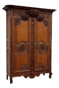 Early 19th century heavily carved oak continental Armoire,