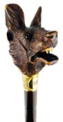 Bamboo walking cane, handle carved as snarling dog's head with glass eyes,
