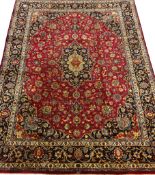 Persian Meshed plum red ground rug carpet, floral design with medallion,