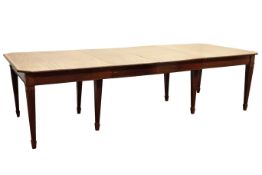 20th century Sheraton style mahogany extending dining table,