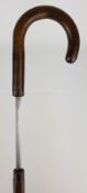 20th century sword stick with steel blade in wooden guard with curved handle,