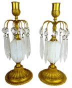 Pair of Regency style gilt metal & glass candlesticks with pineapple bodies and hung with prismatic