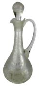 Early 20th century clear glass wine ewer and stopper, bell shaped body etched with game birds,