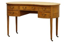 Edwardian inlaid satinwood kidney shaped dressing table with tooled leather inset top, five drawers,