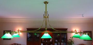 20th century brass six branch billiard table light with green glass shades and scroll detail,