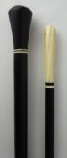 Ebony walking cane, with ivory handle, another with ivory tip,