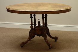 Victorian inlaid walnut oval loo table on four turned columns and cabriole legs, 117cm x 85cm,