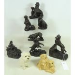 Four Heredities bronze effect dog sculptures, three with signatures, three other similar models,