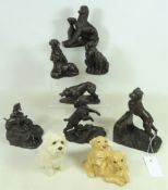 Four Heredities bronze effect dog sculptures, three with signatures, three other similar models,