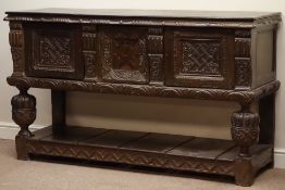 19th century heavily carved oak Jacobean style sideboard, enclosed by three doors,