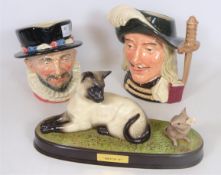 Beswick figure of a Siamese cat and mouse 'Watch It' and two Royal Doulton character jugs