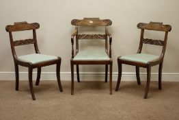 Set four (3+1) Regency walnut saber leg dining chairs, carved top and middle rail,