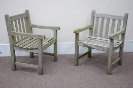 Pair solid teak garden armchairs