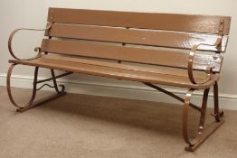 Wrought metal and wooden slated garden bench,