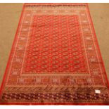 Persian Bokhara design red ground rug/wall hanging,