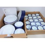 White and blue rim enamel dinner and teaware in two boxes Condition Report <a