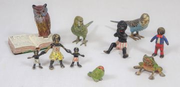 Eight cold painted bronze miniature figures; two Budgies, Tawny Owl on a open book, frog, Parakeet,
