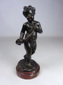 Late 19th Century bronze figure of a cherub on marble base,