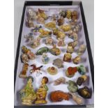 Collection of Wade whimsies and other miniature ceramic models in one box Condition