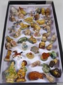 Collection of Wade whimsies and other miniature ceramic models in one box Condition