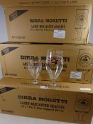 Two boxes of discontinued Birra Moretti pint glasses (52) and sixteen Birra Moretti half pint