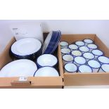 White and blue rim enamel dinner and teaware in two boxes Condition Report <a