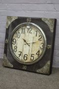 Industrial wall clock, pierced metal frame with circular dial,