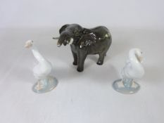 Beswick elephant and two Lladro swans (3) Condition Report <a href='//www.